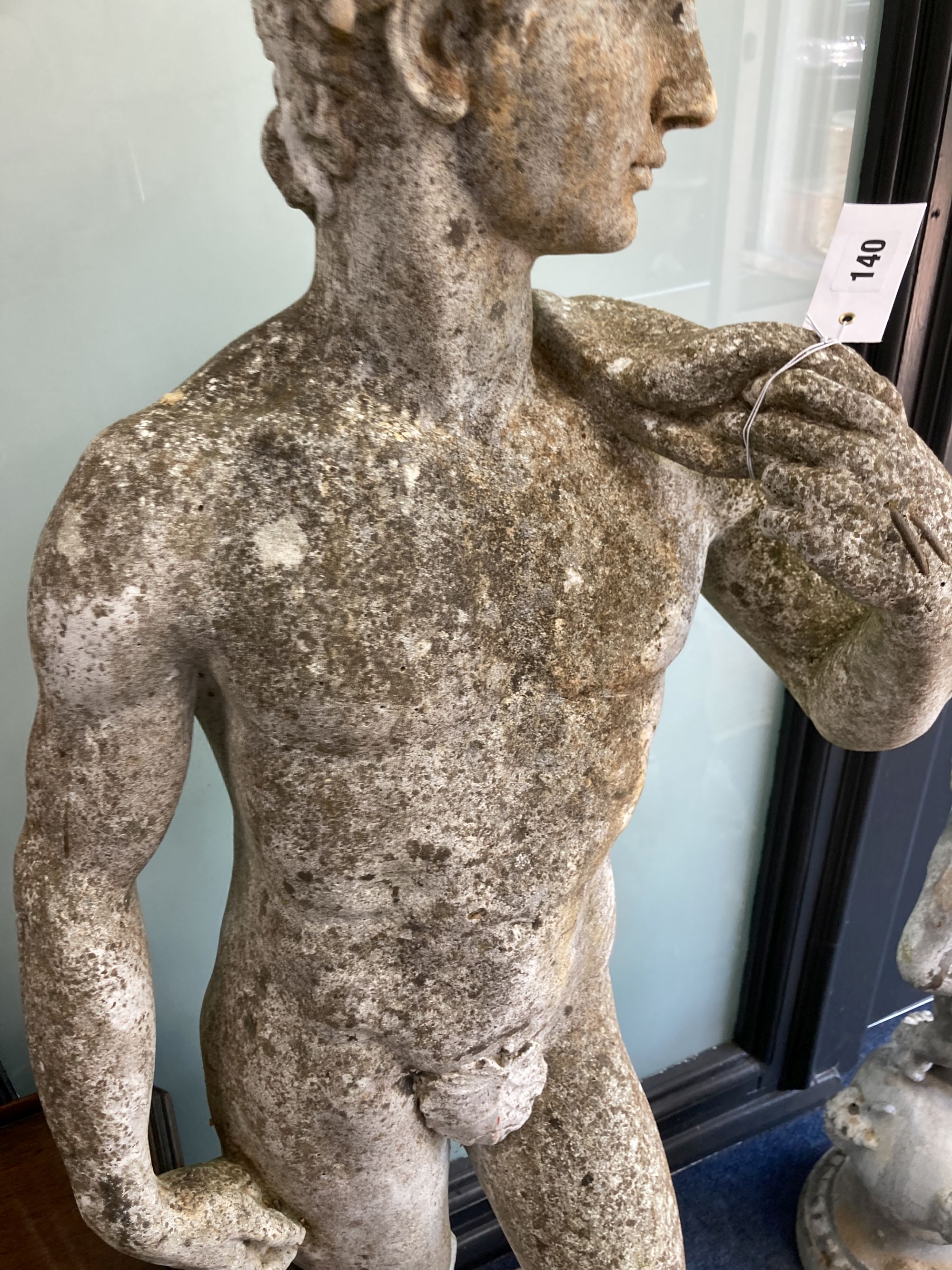 A reconstituted stone garden ornament of David, height 130cm